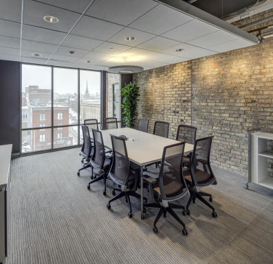 A workshop setting with a presenter and team discussion